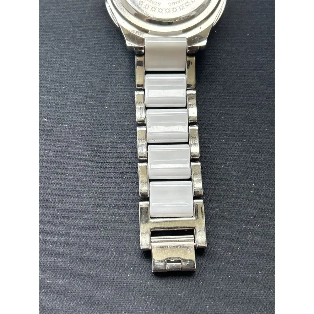 Burgi White And Silver Tone Rhinestone Bezel Women’s Quartz Watch